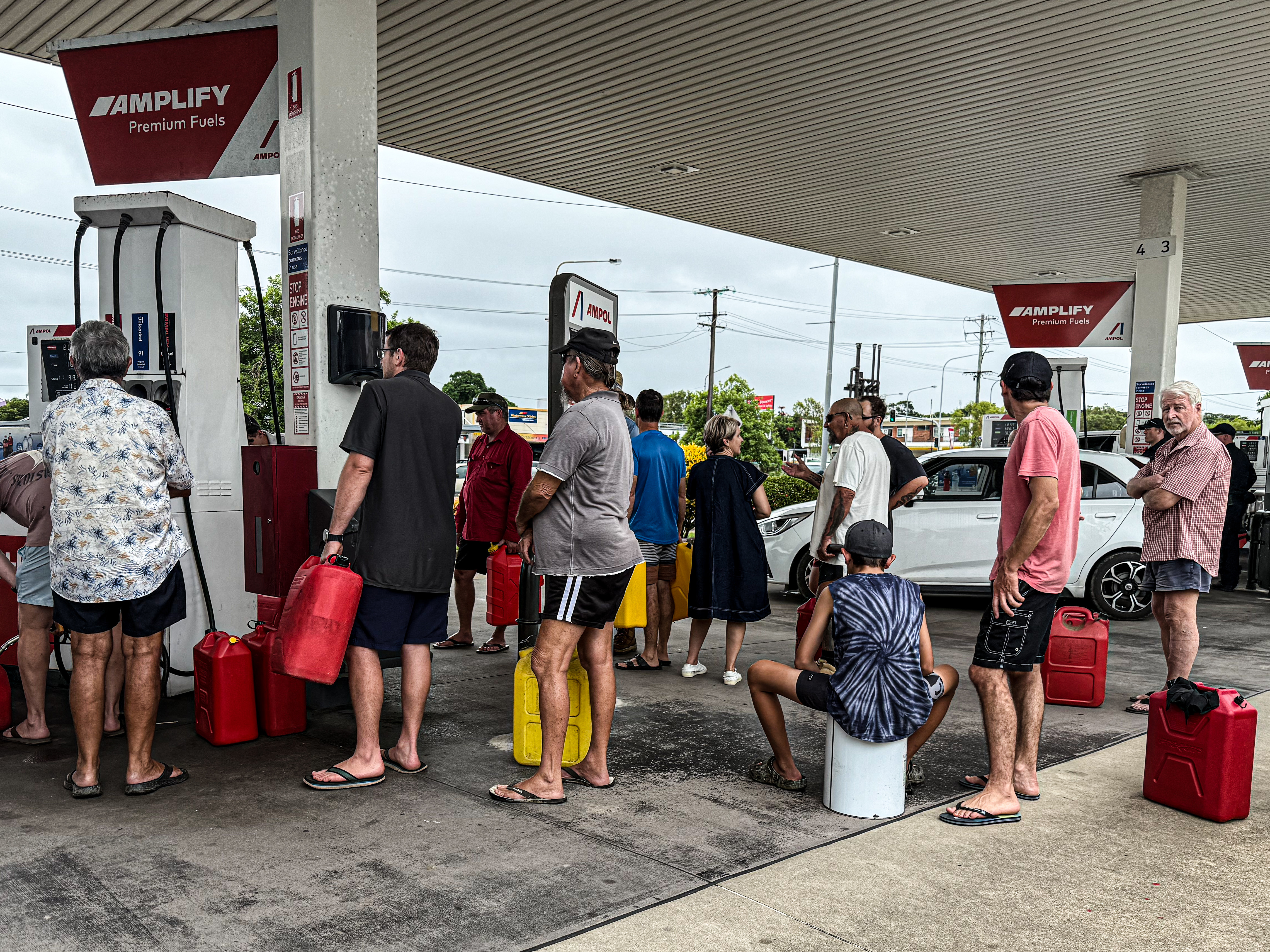 Two dead, one missing, as more rain forecast for inundated North Queensland