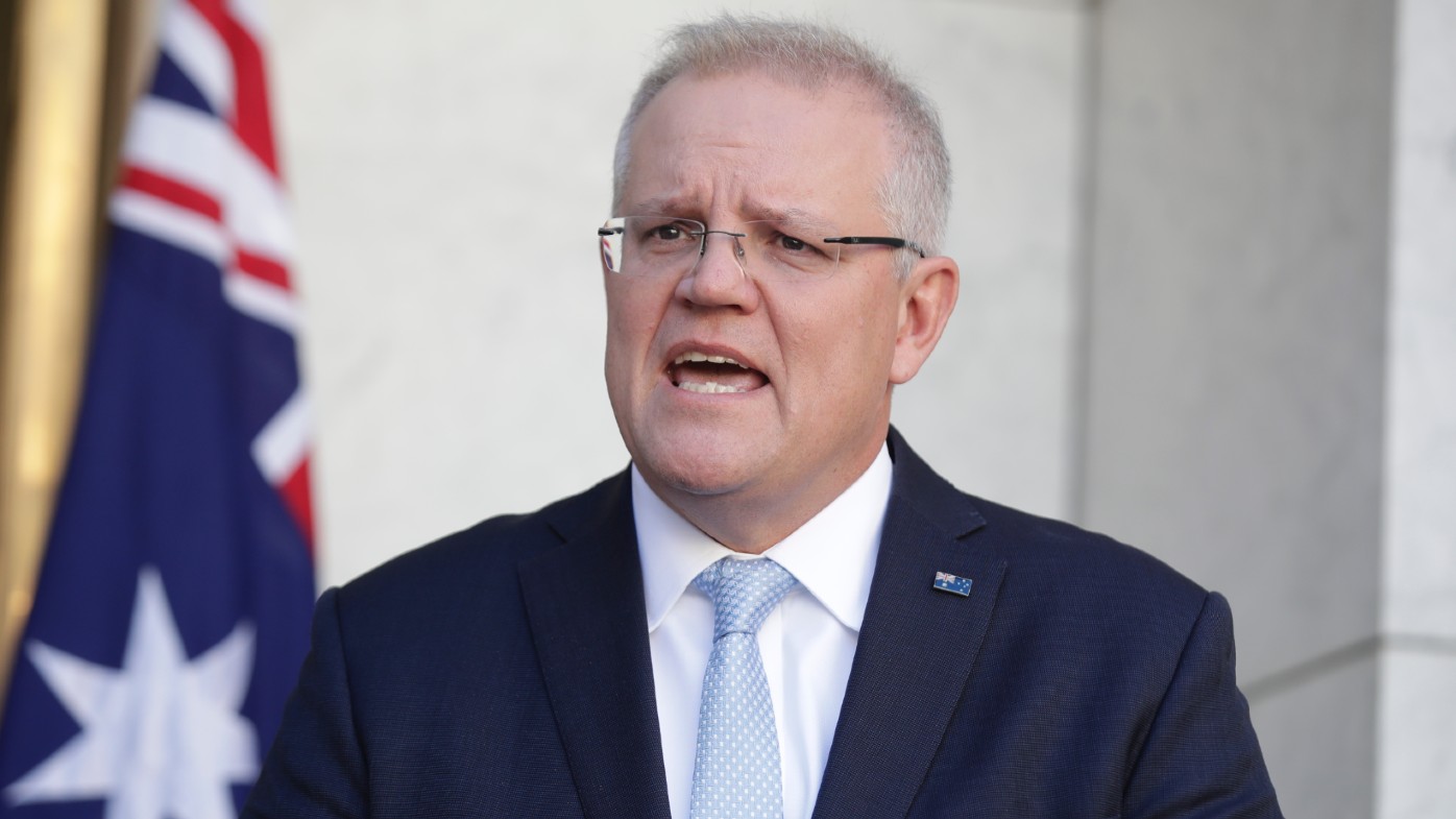 Scott Morrison unveils the changes to JobKeeper and JobSeeker in Canberra today.