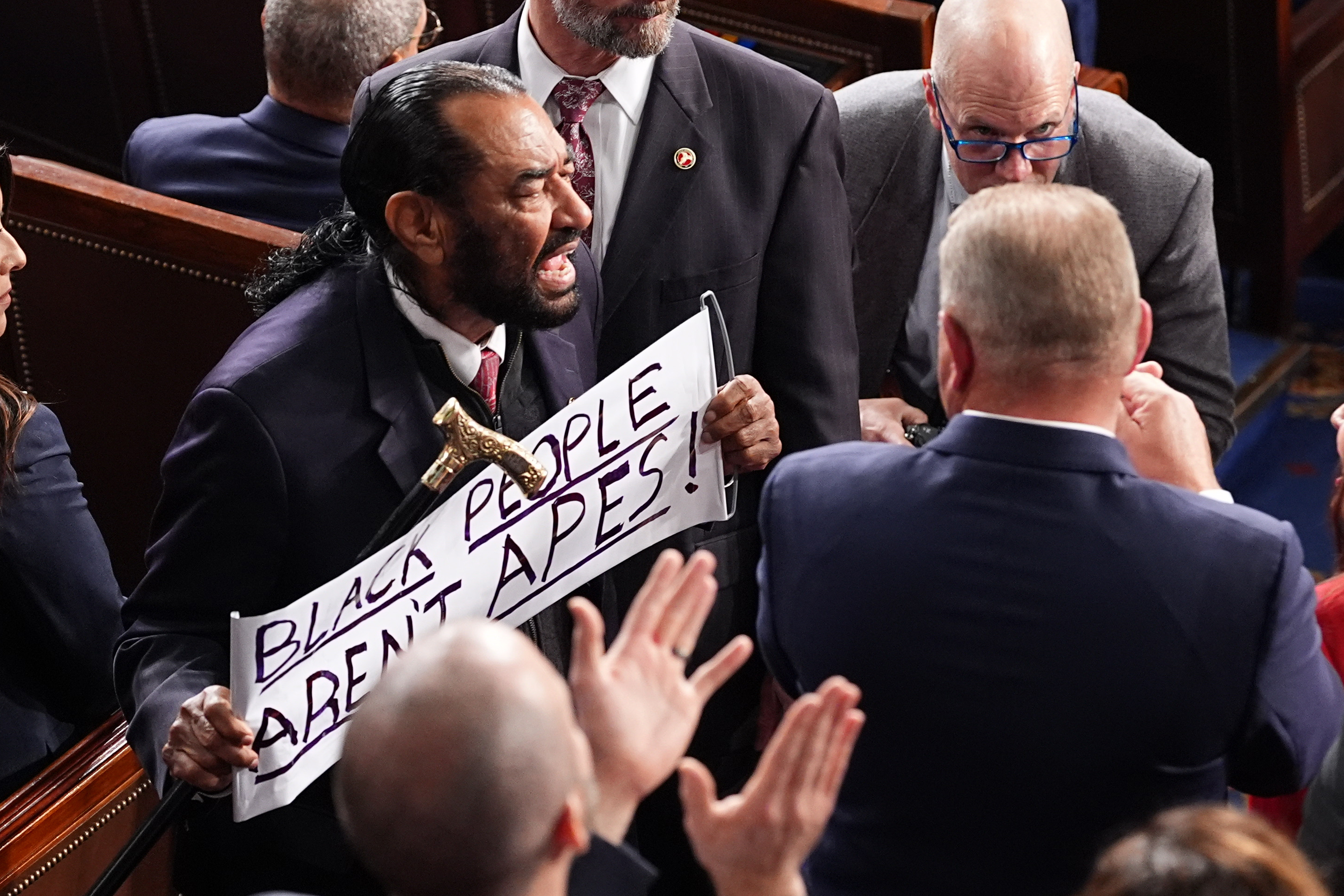 Rep. Al Green, D-Texas, is escorted out President Donald Trump delivers the State of the Union address to a joint session of Congress in the House chamber at the U.S. Capitol in Washington, Tuesday, Feb. 24, 2026, as Rep. Troy Nehls, R-Texas, watches. (AP Photo/Matt Rourke)