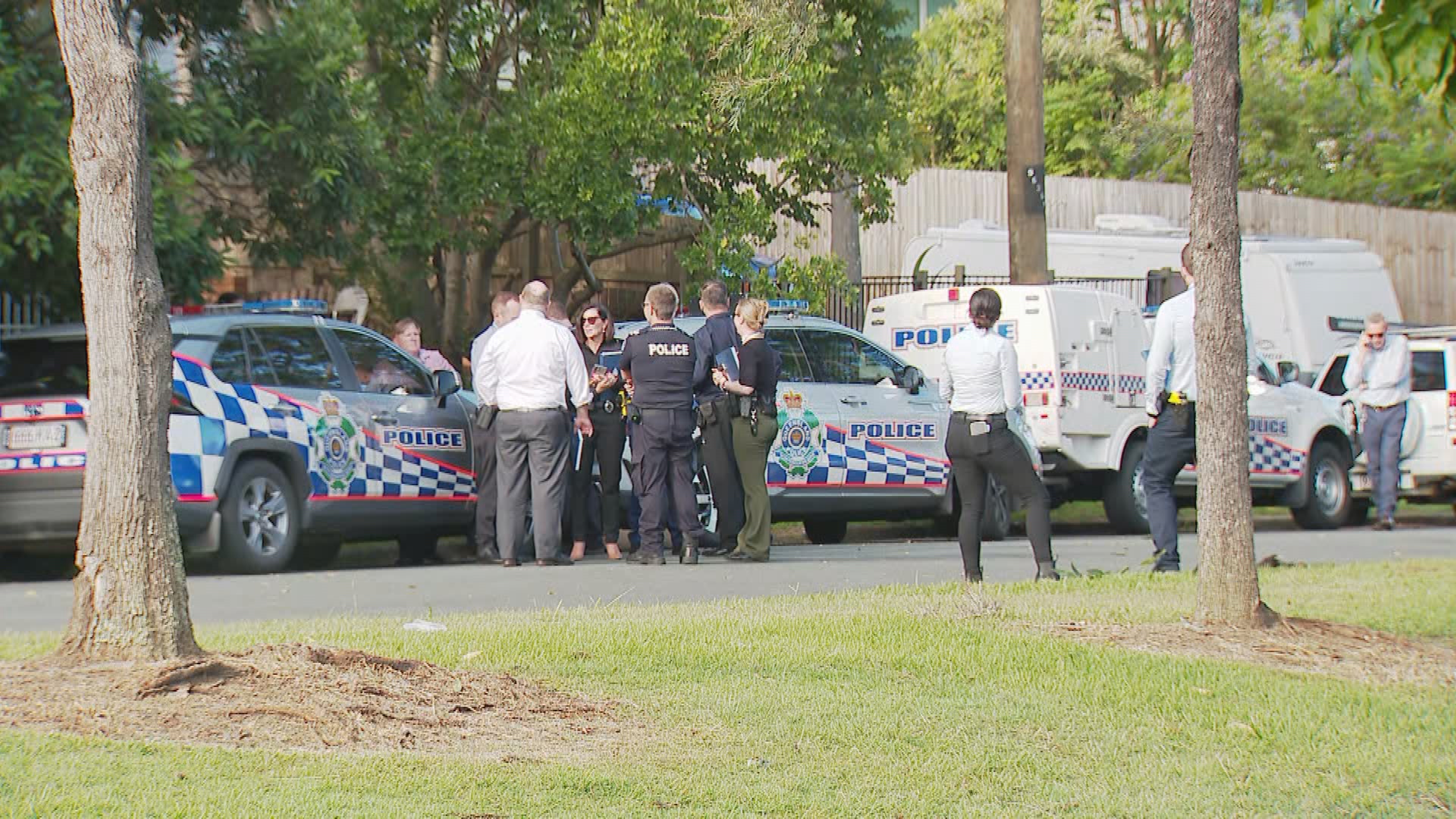 A strong police presence remains outside the Arana Hills home.
