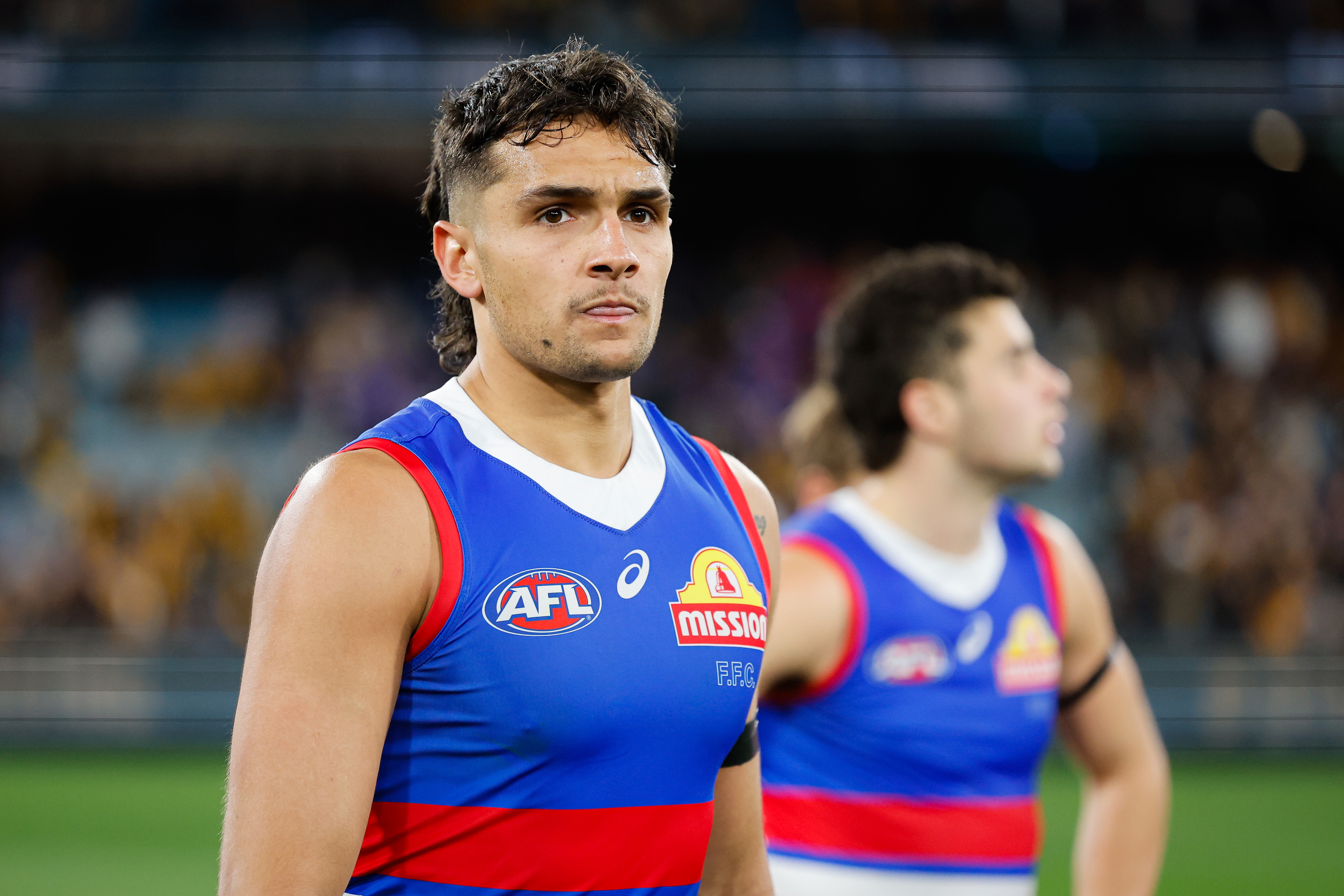 Jamarra Ugle-Hagan of the Bulldogs looks dejected after their 2024 elimination final loss to Hawthorn.