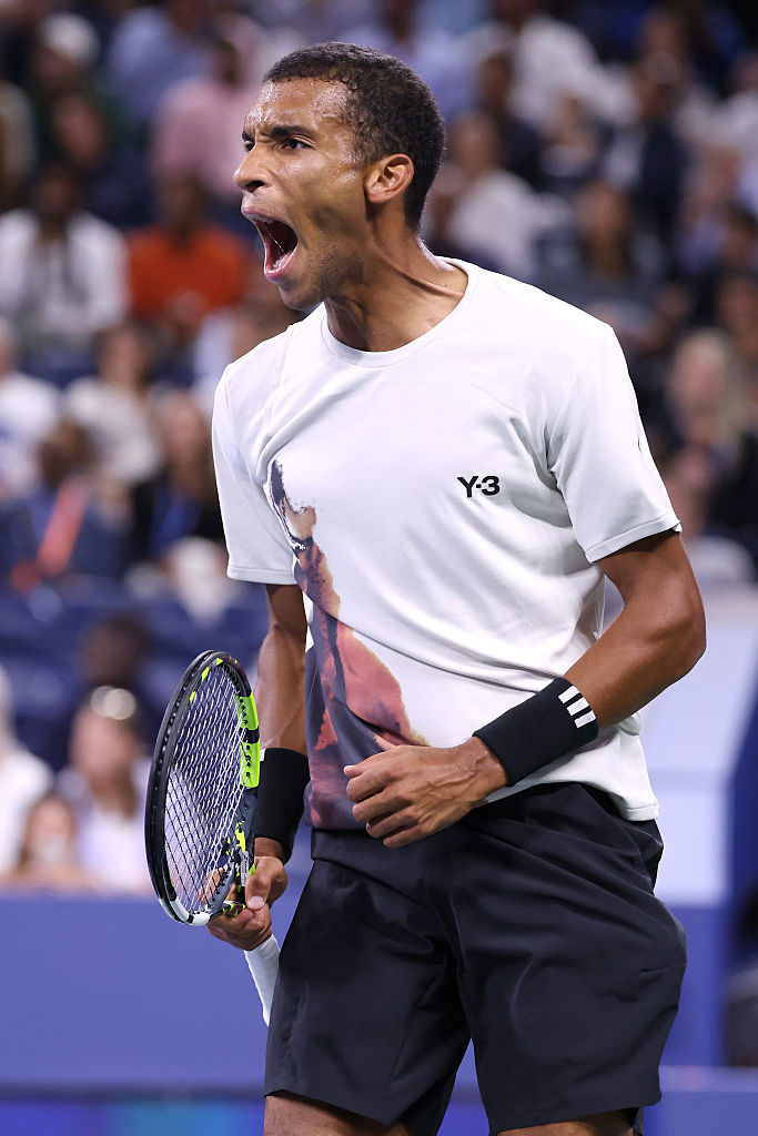 Felix Auger-Aliassime of Canada reacts against Alexander Zverev of Germany.