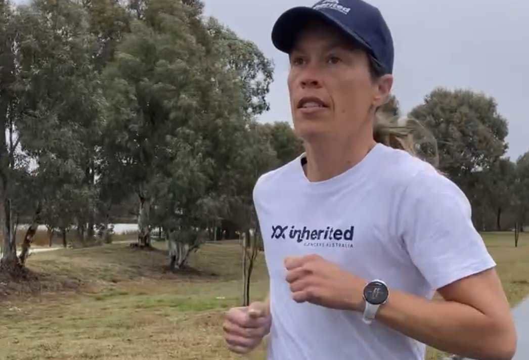 Robyn Smith will run this weekend's Voltaren City2Surf with a message painted over mastectomy scars.