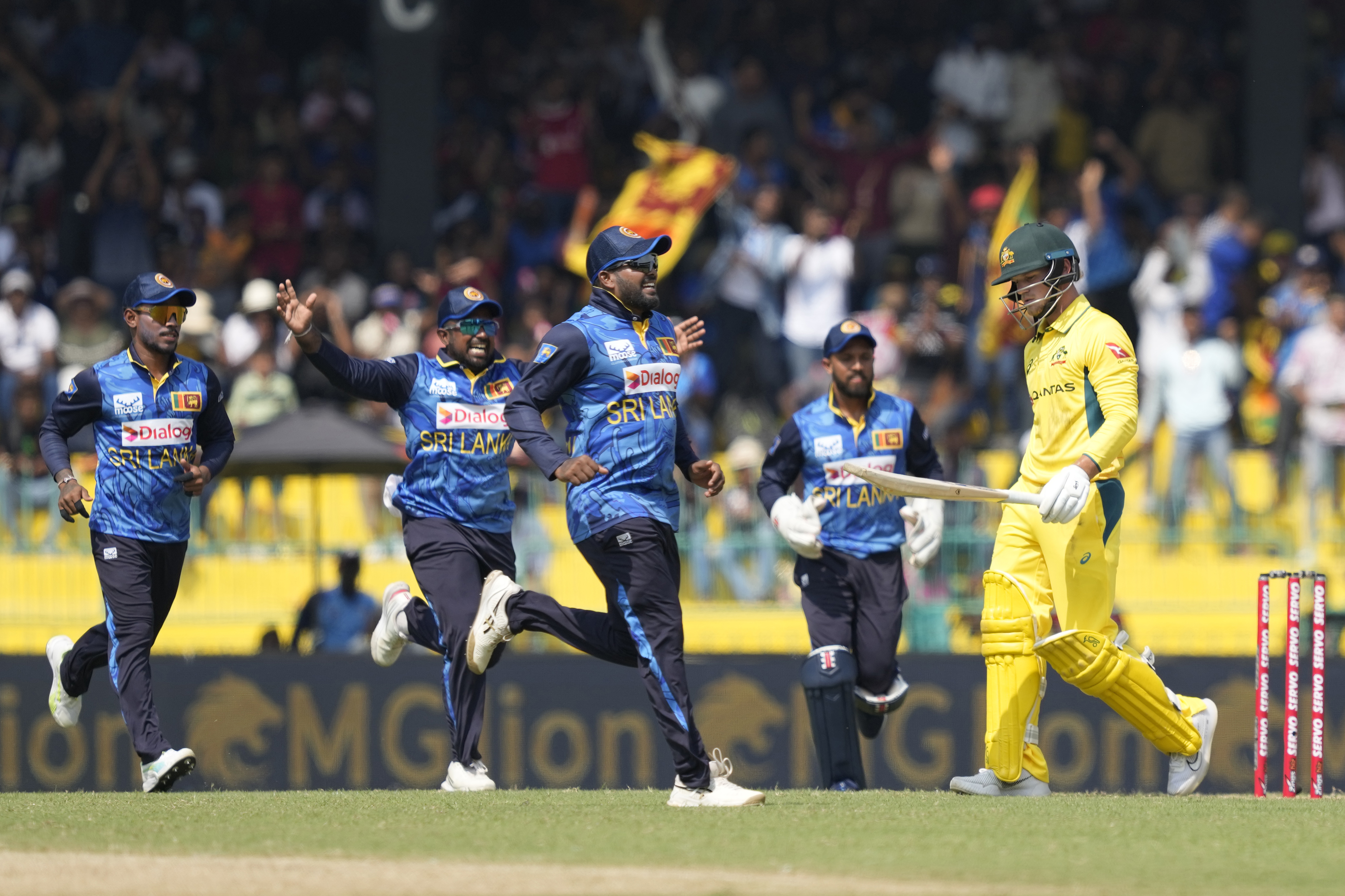 Australia's Jake Fraser-McGurk leaves the ground after losing his wicket to Sri Lanka.