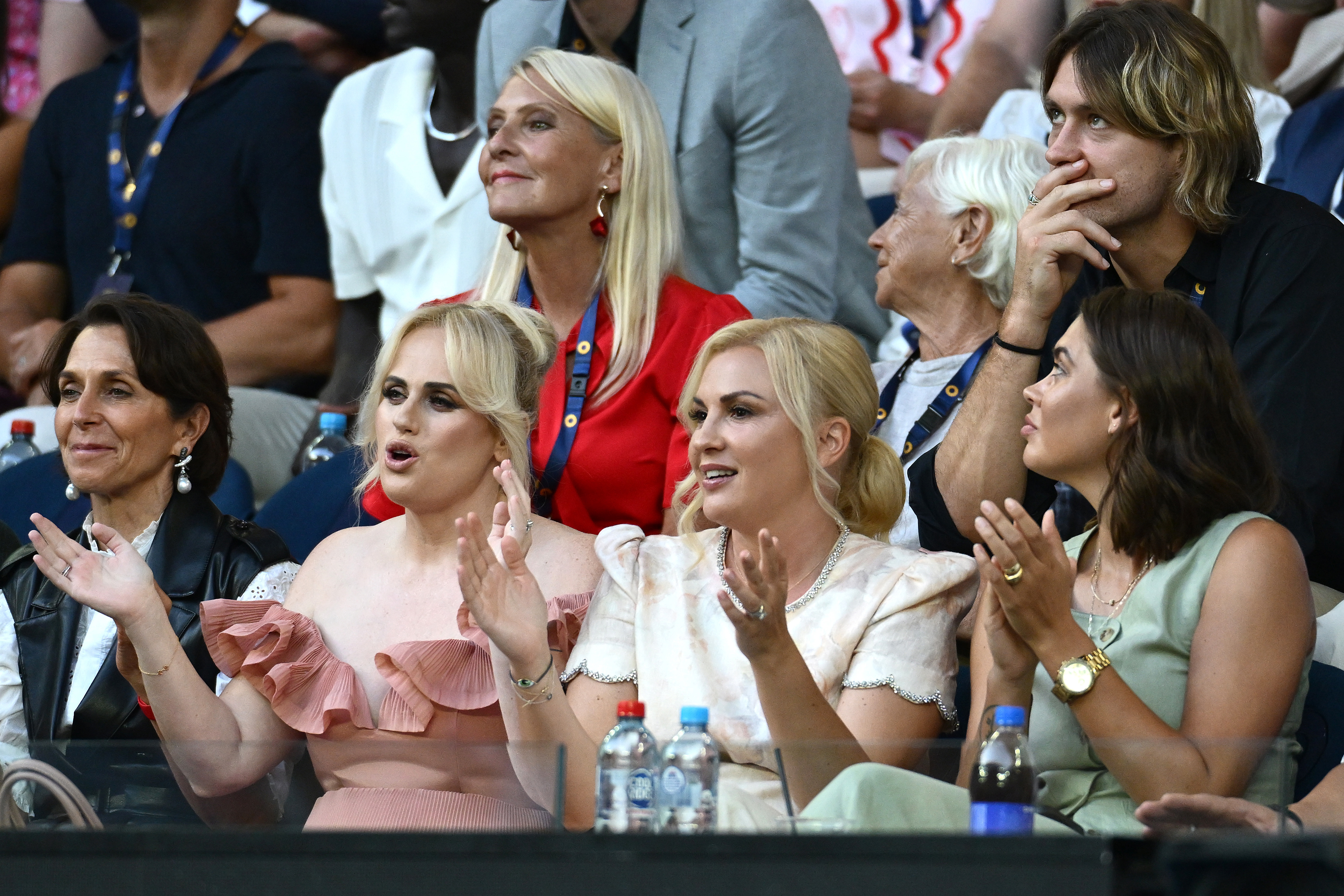 MELBOURNE, AUSTRALIA - JANUARY 12: Rebel Wilson and wife Ramona Agruma watch the Women's Singles First Round match between Aryna Sabalenka and Sloane Stephens of the United States during day one of the 2025 Australian Open at Melbourne Park on January 12, 2025 in Melbourne, Australia. (Photo by Quinn Rooney/Getty Images)