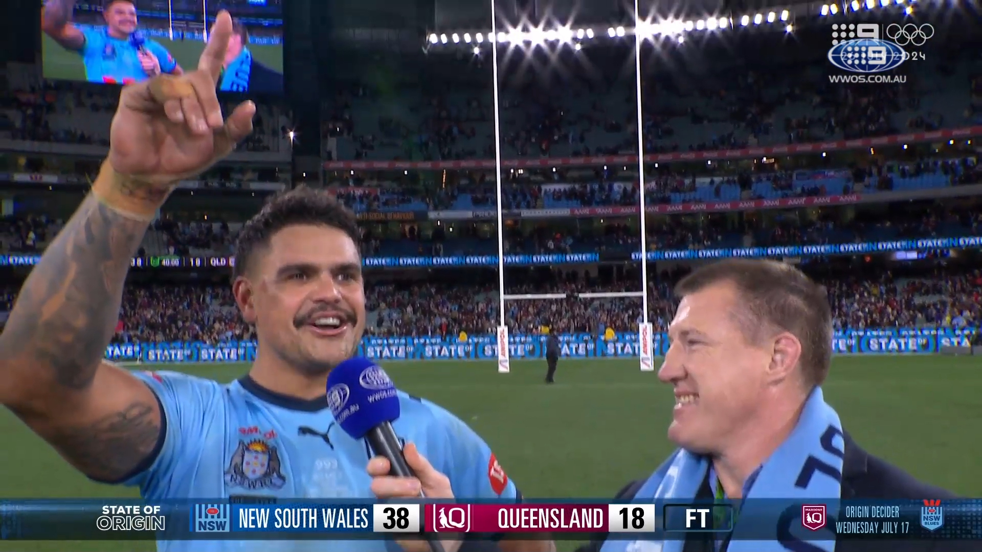 Latrell Mitchell jeered as he recounts NSW's victory.